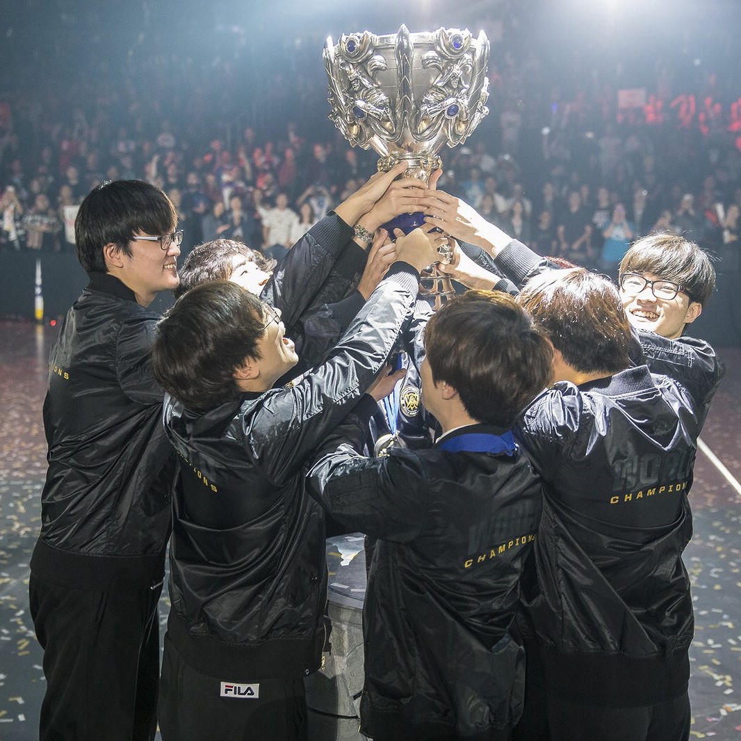 SK Telecom T1 hoisting their third Summoner's Cup - courtesy of LoLEsports