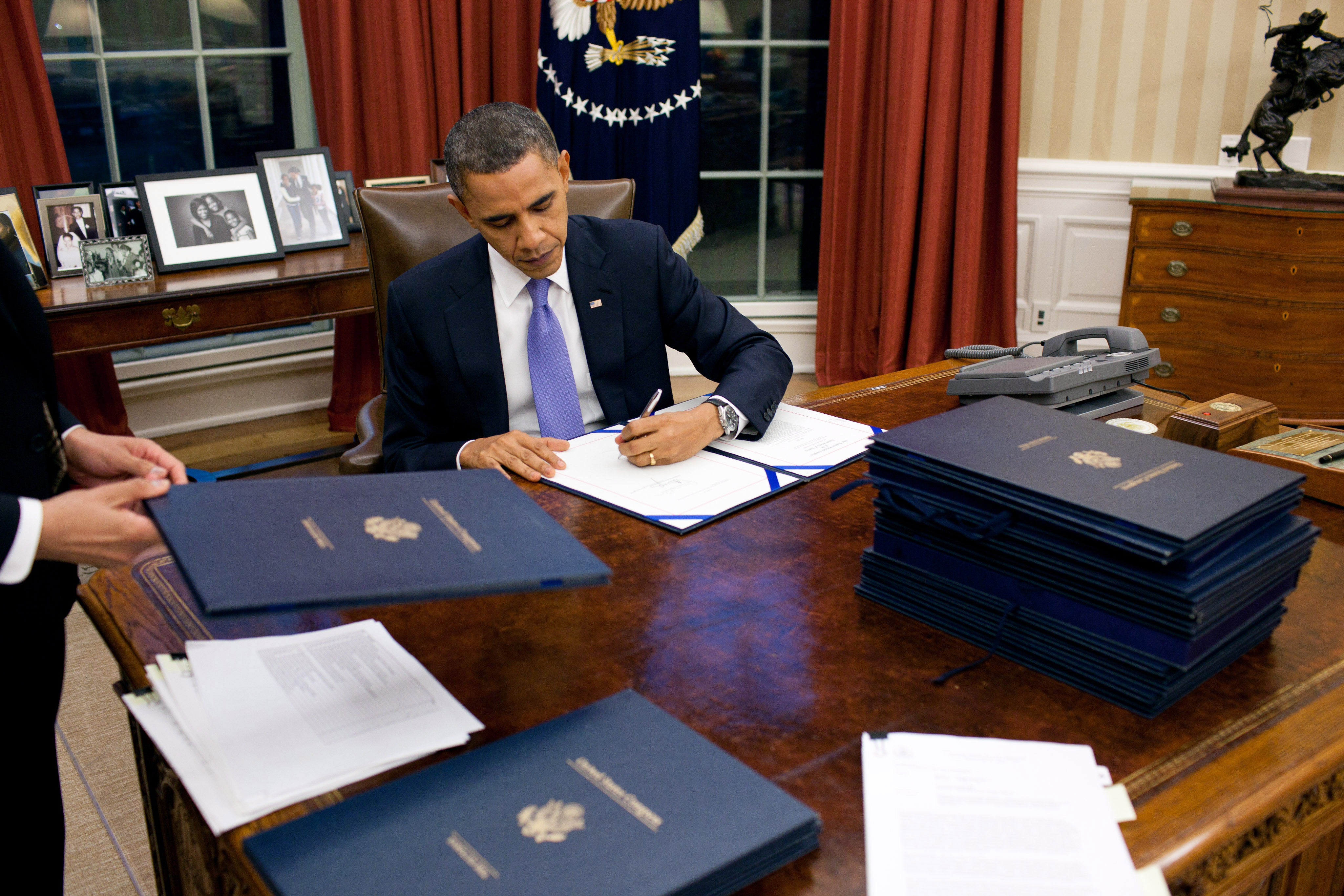 Barack Obama Signing Legislation