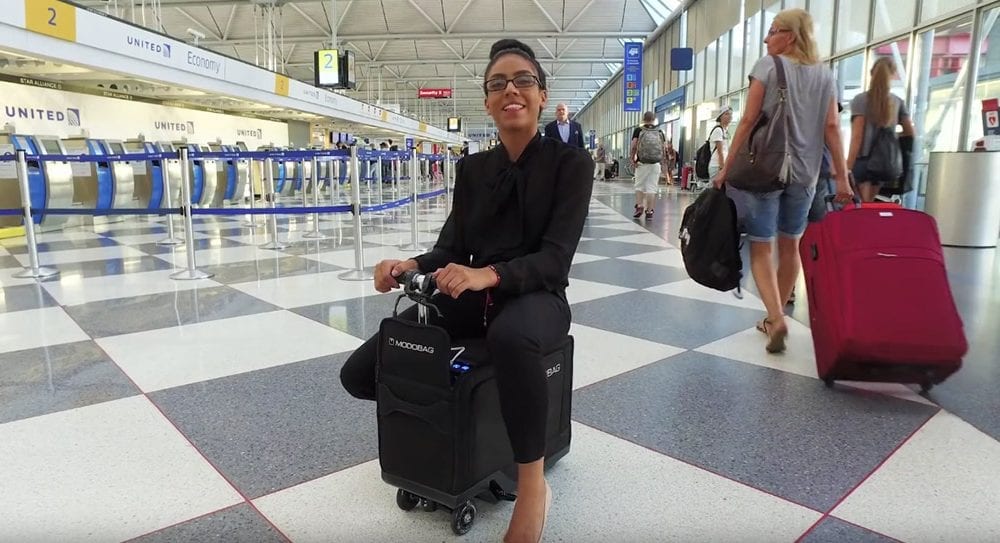 airport scooter suitcase