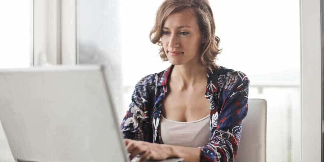 Woman using a laptop women in tech