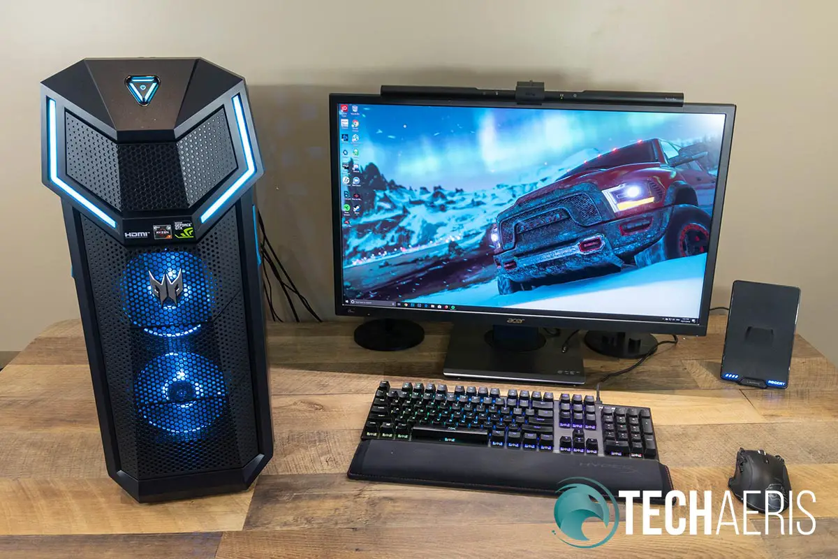 The Acer Predator Orion 5000 gaming desktop is definitely a beast... 27" monitor for comparison