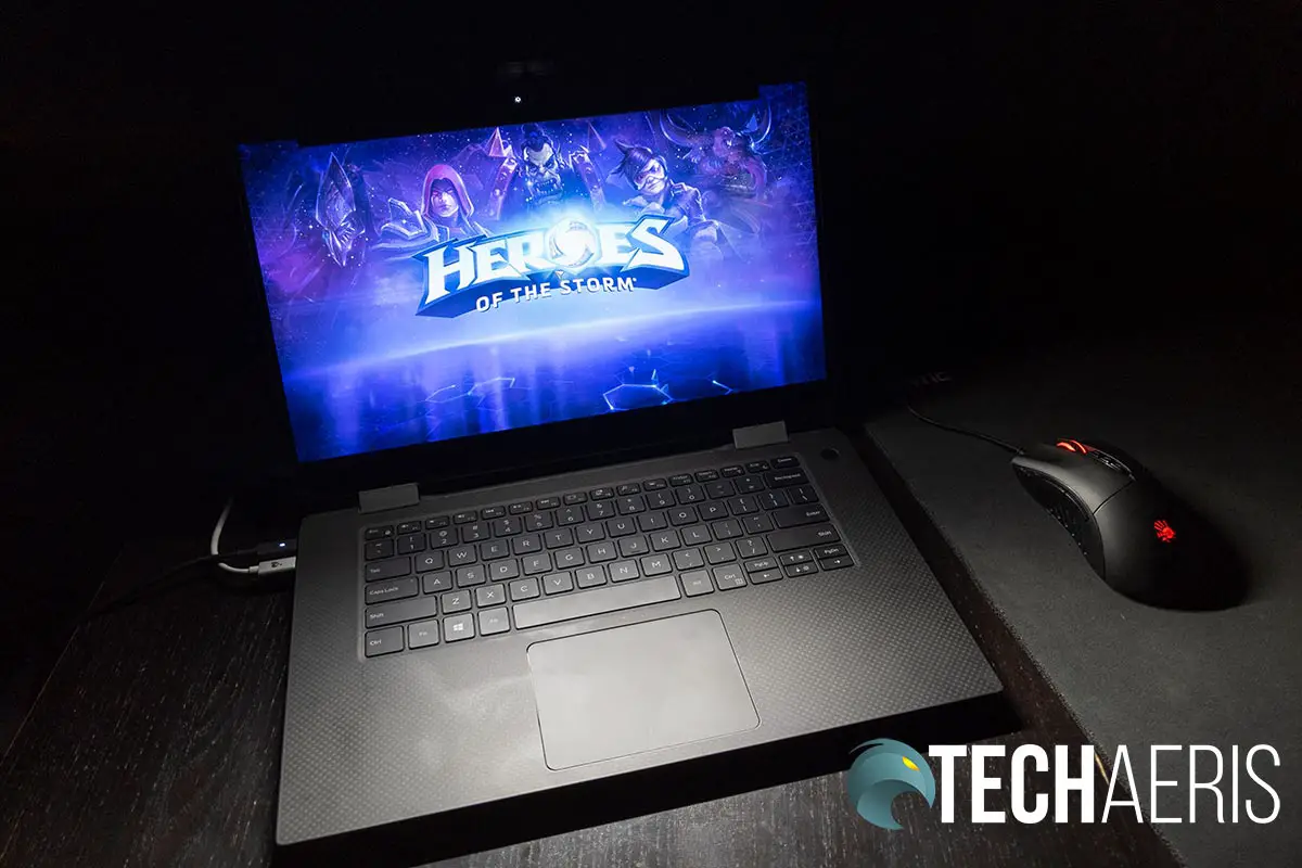 The BenQ ScreenBar Lite illuminating a laptop keyboard