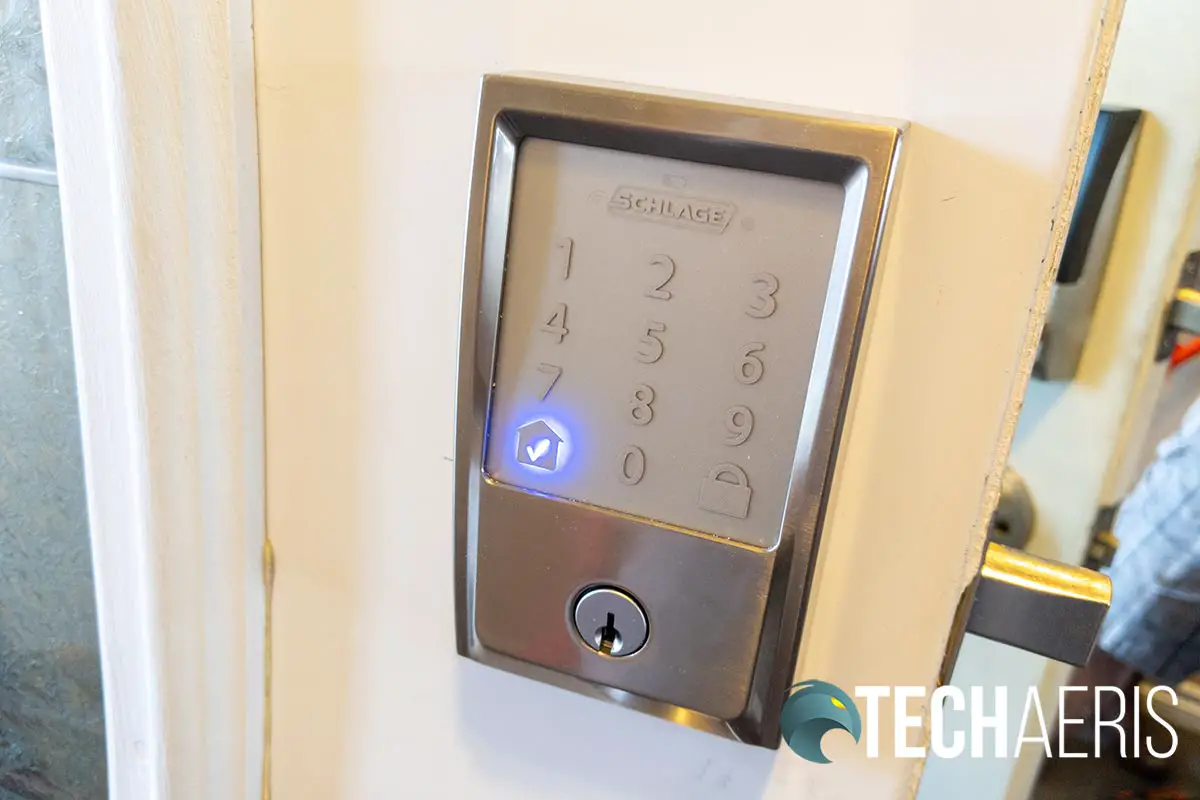 The checkmark indicates the code entered is correct or locking is complete on the Schlage Encode Smart Wi-Fi Deadbolt