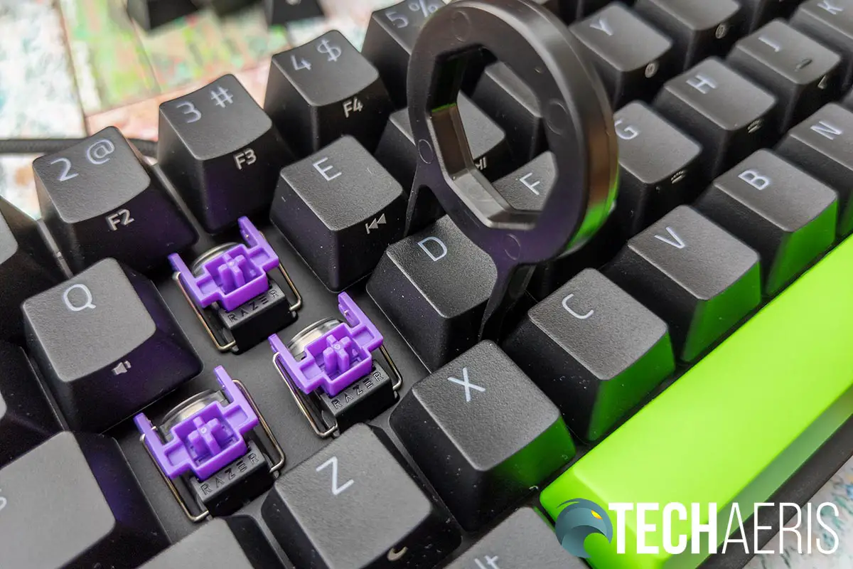 Use the included keycap puller to remove the keys you want to replace