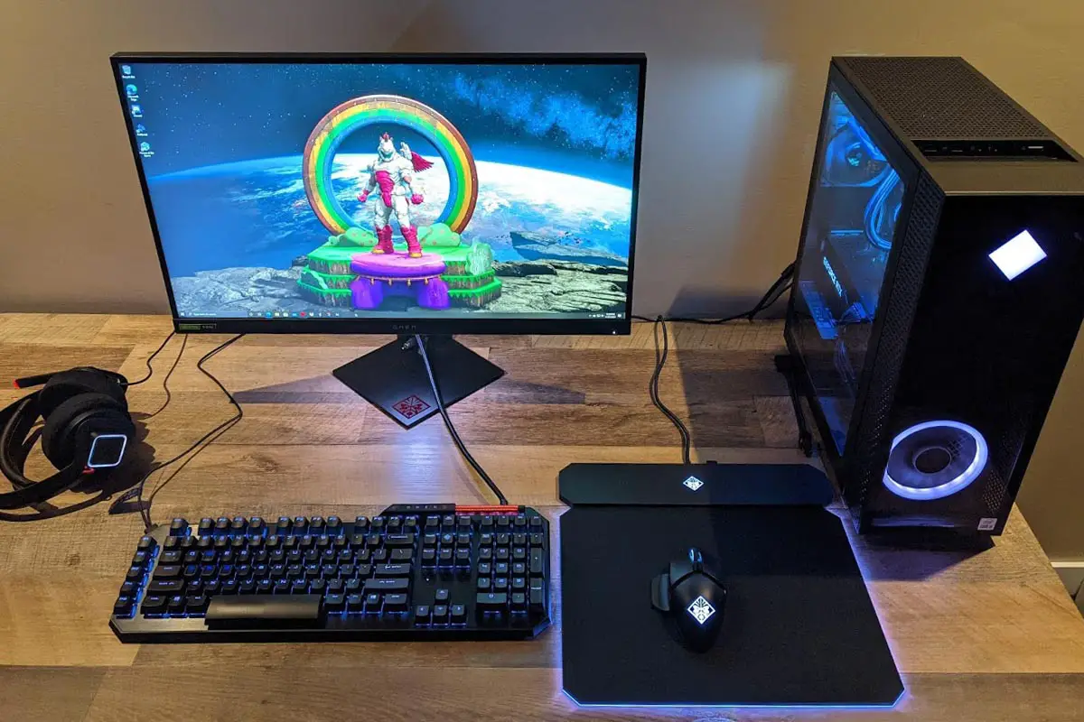 The HP OMEN 30L gaming desktop with OMEN 27i gaming monitor and peripherals