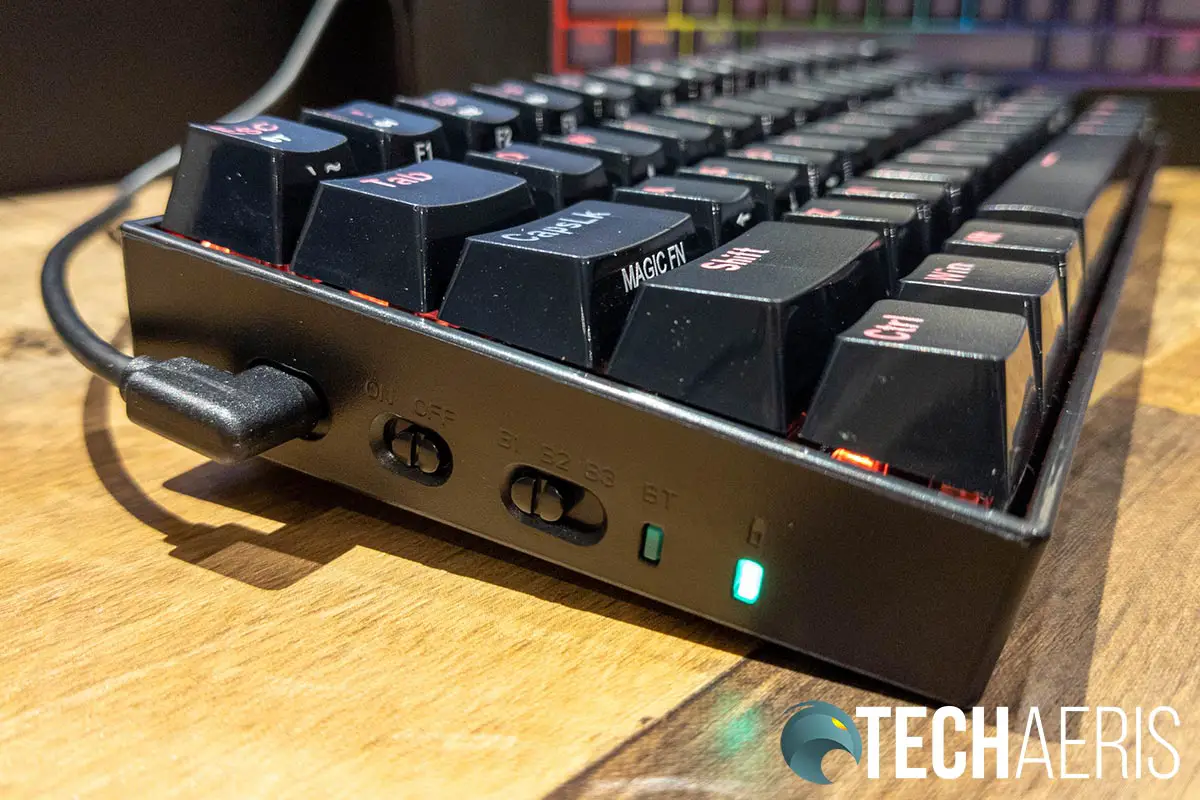 The USB Type-C port, selector switches, and LED lights on the side of the Redragon K530 Draconic 60% mechanical keyboard