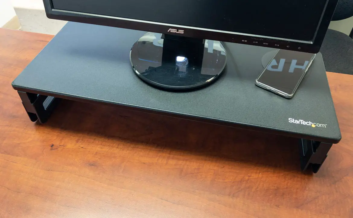 The StarTech Monitor Riser Stand with Wireless Charging Pad