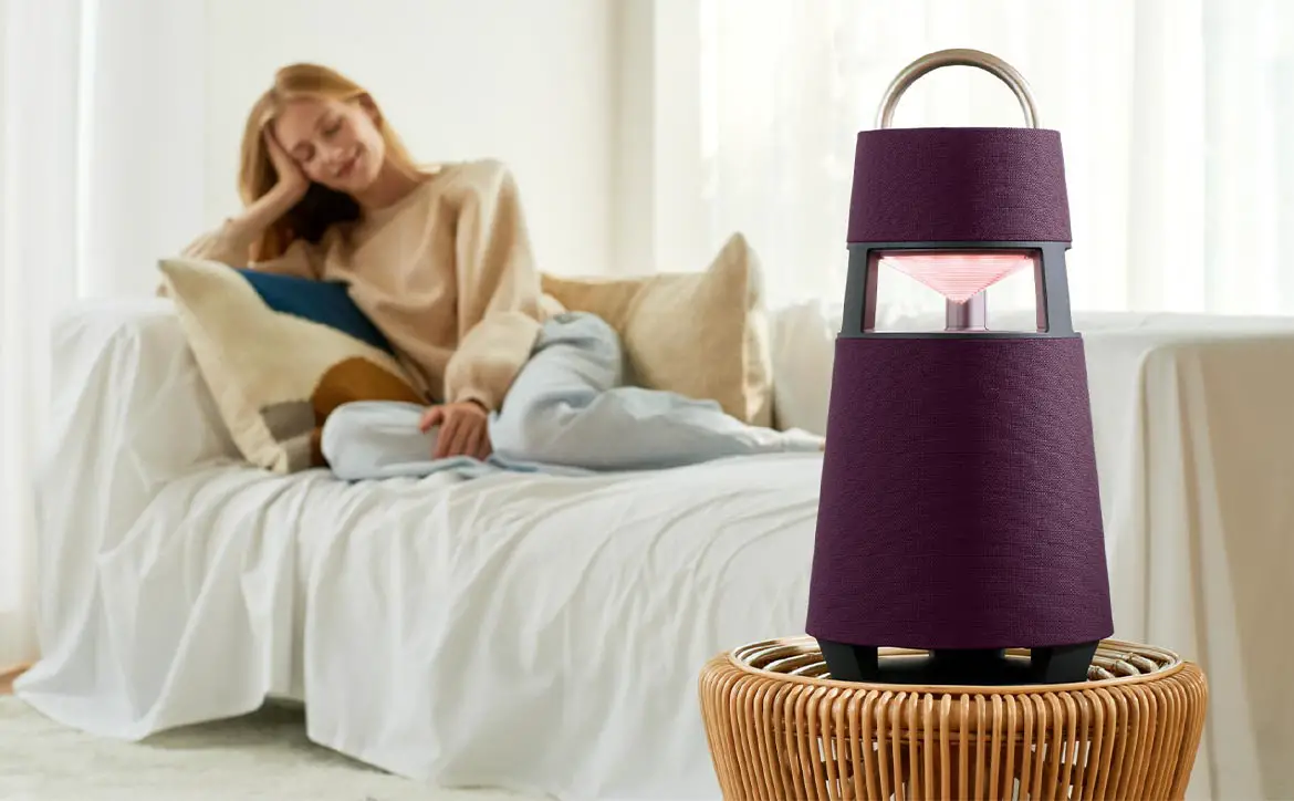 LG XBOOM 360 Bluetooth speaker in burgundy