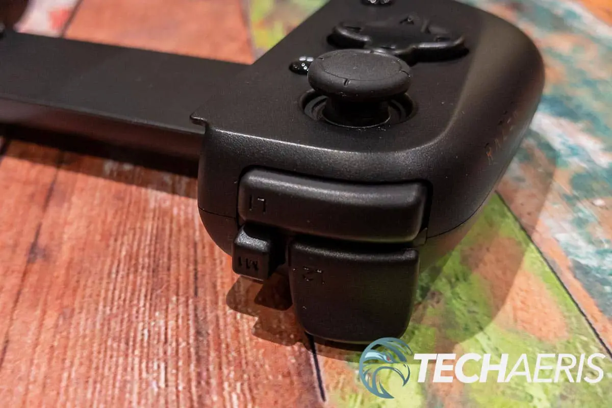The trigger, bumper, and remappable button on the Razer Kishi V2 mobile game controller