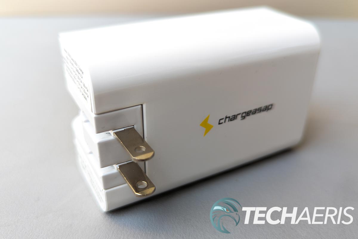 The Chargeasap Zeus 270W USB-C GaN Wall Charger with the US plugs extended at a right angle