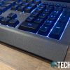 Front angle view of the Razer Cynosa V2 membrane gaming keyboard with Razer Chroma lighting on