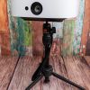 The Nebula Solar Portable projector mounted on the optional tripod