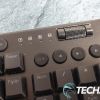 The media buttons and volume rocker on The Redragon Horus K618 wireless mechanical gaming keyboard