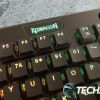 The Redragon logo on the front of the Redragon Horus K618 wireless mechanical gaming keyboard