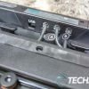 The bottom of the Logitech G PRO Racing Pedals showing the cable connections