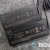 The voltage and other information on the bottom of the Monoprice 65W and 100W Laptop Chargers