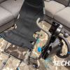 The wheel plate flips open to make it easy to get in and out of the Playseat Challenge X — Logitech G Edition sim racing seat frame